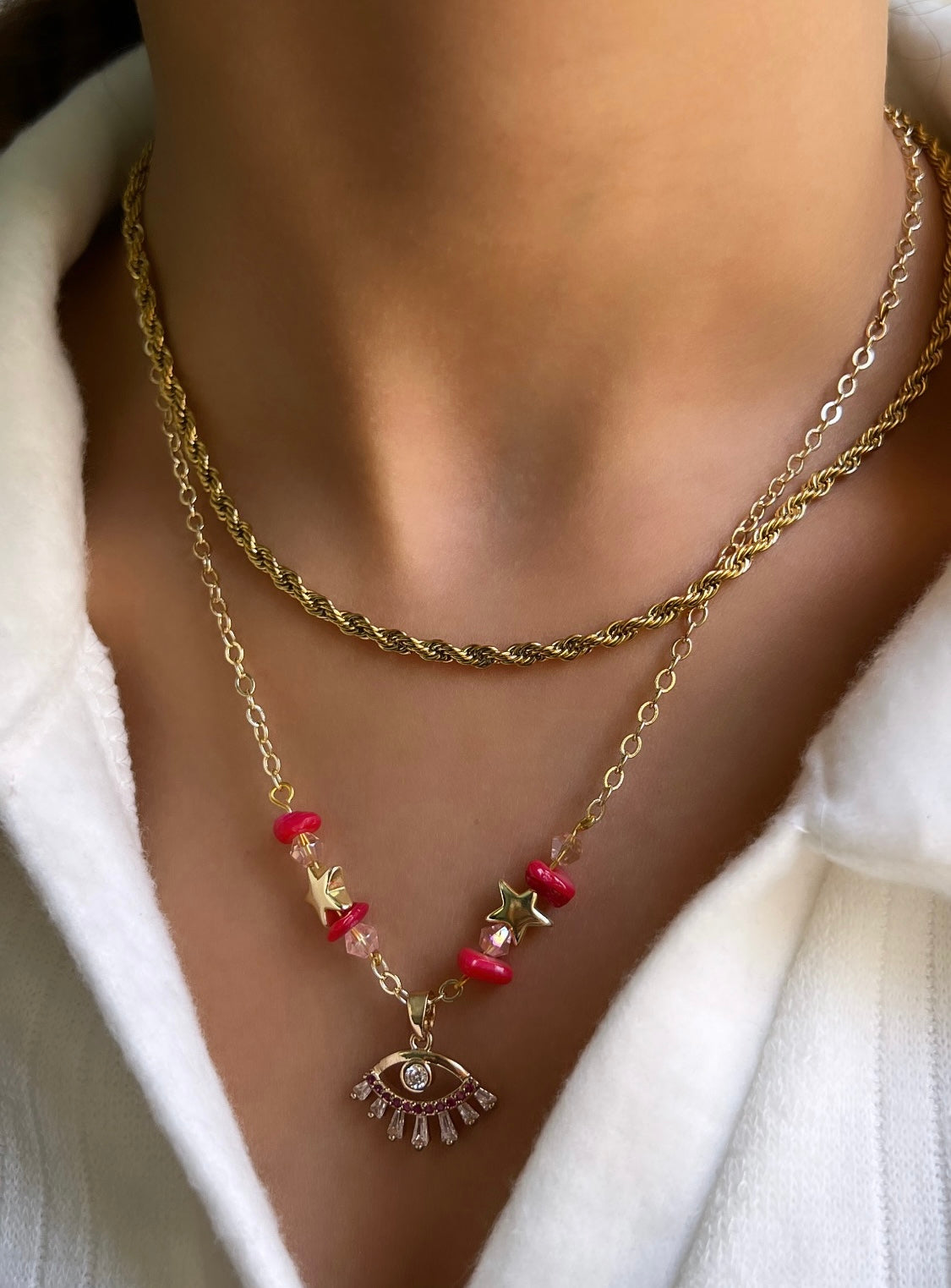 The pink eye necklace